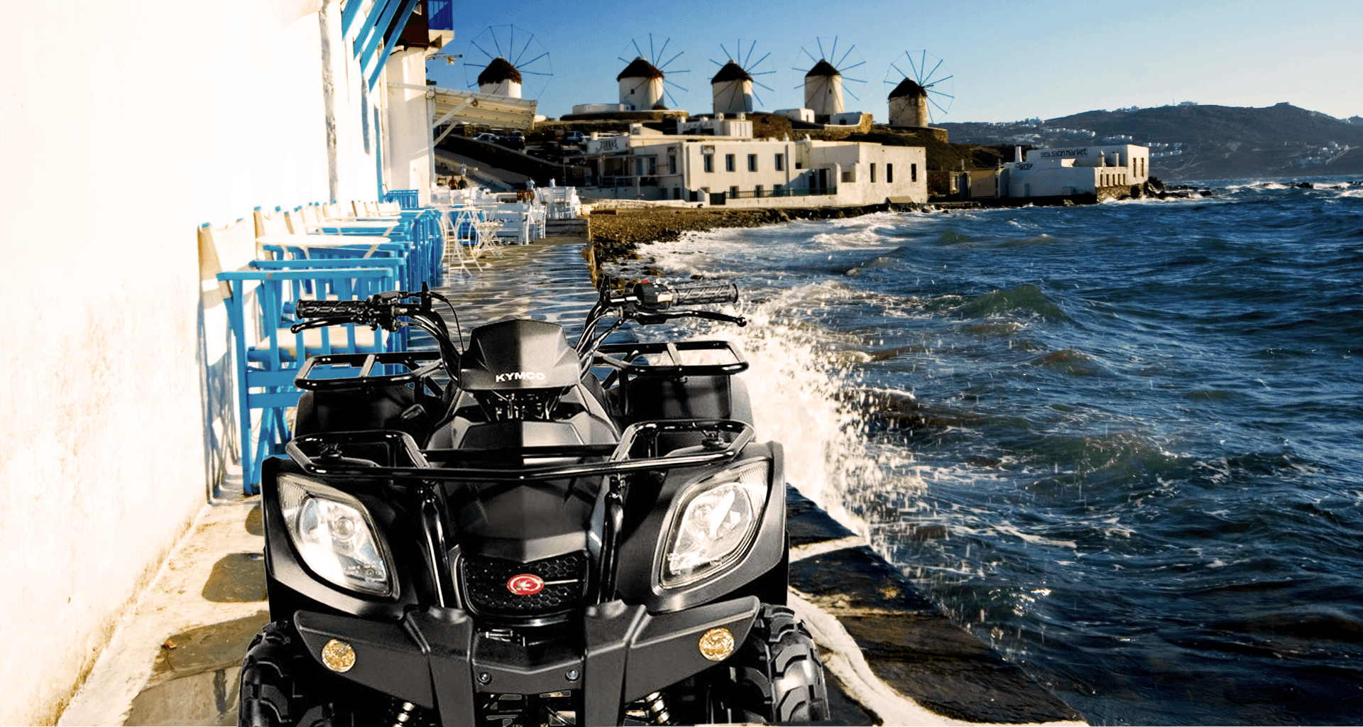 A Kymco ATV parked on the Mykonos waterfront, the Kato Mili windmills behind